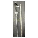 Black cane with horse head handle