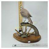 MEADOW LARK ON WAGON WHEEL