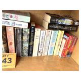 SHELF OF PAPERBACK BOOKS