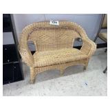 SMALL CHILDS WICKER BENCH - NEEDS REPAIR ON BACK