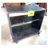 SMALL TV STAND ON ROLLERS