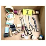 SCISSORS AND THREAD SPOOLS