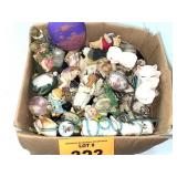 BOX OF SHELLS AND FIGURINES