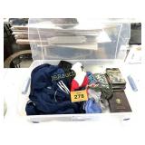 ROLLING PLASTIC TOTE WITH CLOTHES
