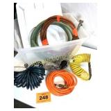 TOTE WITH AIR HOSES, WATER HOSE, ETC