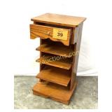 SMALL WOOD SHELF ON CASTERS WITH DRAWER.