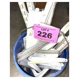BUCKET OF SHELVING ACCESSORIES