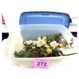 PLASTIC TOTE WITH PLASTIC FLOWERS
