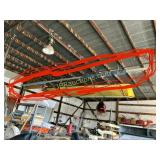 LONG ALUMINUM TUBES HANGING FROM CEILING