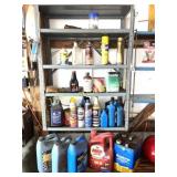CHEMICALS AND GRAY SHELF ON WALL