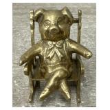 Brass Pig in Rocking Chair