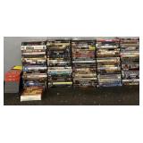 Large Assortment of DVDs and VHS Cassettes