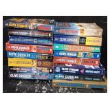 (16) Clive Cussler Paperback Books