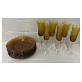 (9) Amber Glass Plates & (6) Amber Stemmed Glasses