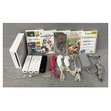 Wii System, (4) Controllers & (5) Games