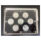 (7) New Orleans Morgan Silver Coins
