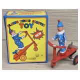Wind-up Clown Riding Scooter Toy