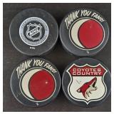 (4) Hockey Pucks