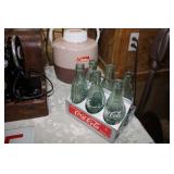 old metal Coke carrier with bottles