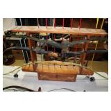 recurve bows, top camo ptd Bear, middle Ben Pearson >>