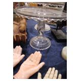 another cake plate with hand stem