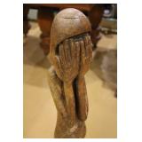 sculpture of shy woman >