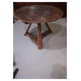 interesting tilt top table >