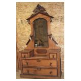 and dresser with mirror and candle shelves