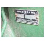 tag located below seat on rear housing >