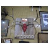 Mule deer antlers with shotgun shell coat hooks