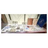 collection of coins & currency> collection of coins & currency>