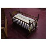 rocking spindle cradle >