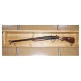 shelf with blown barrel shotgun