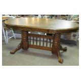 twin bridged pedistal table>