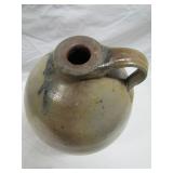 unusual flattened rim on mouth>