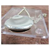 folded pendant, signed