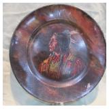 tin souvenir plate with >>