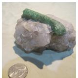 Beyrl sphere set in quartz>