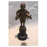 bronze boy staue with >