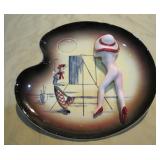 being painted by artist - ashtray?