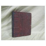 tin covered photo album