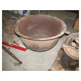 large cast iron cauldron>