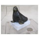 small bronze Walrus signed >