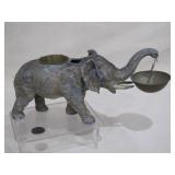 spelter elephant with cigarette, 