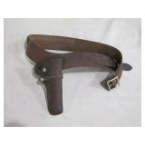 leather holster marked >>