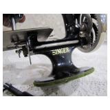 sewing machine w/hold down clamp>