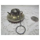 sterling tea holder>
