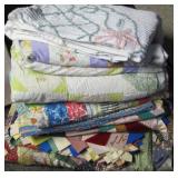 stack of quilts>>>>