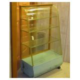 small floor model curved glass slant front>