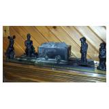 carved coal figurine >>